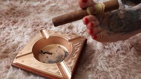 Watch Mistress Mel Fire Smoking Her Cigar with Her Feet