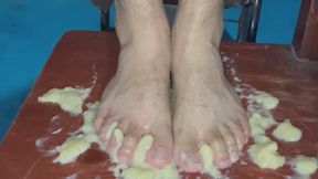 Squashing a banana with my feet