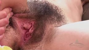 The Beautiful Hairy Woman Enjoys the Orgasm