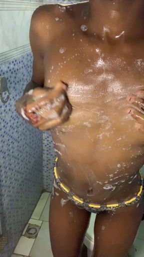 Hot ebony babe bathroom section shaking boobs and ass to the camera