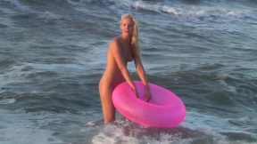 Hot naked blonde on the beach