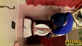 Devin Reynolds grabs his prick & unloads in the toilet