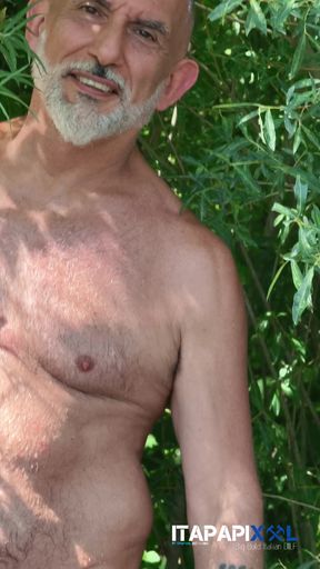 Outdoor naked mature man with uncut softie cock