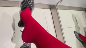 Red tights black sparkly shoe changing room dangle