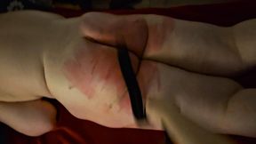 Heavy Belting on Previously Caned Ass