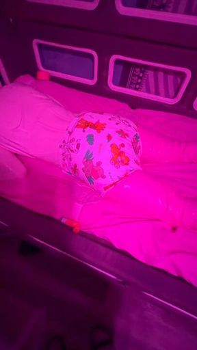 Diapered rubber doll