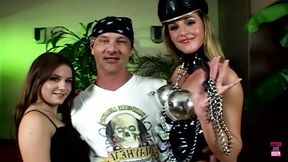 A Bound Blonde Beauty Takes Double Penetration In A Latex Storm