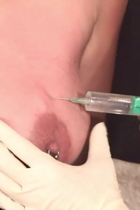 Milf gets tits injected while bound and blind folded