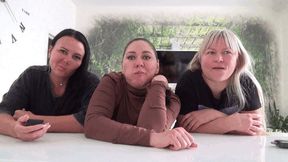 THREE GIRLS LOOKING AT THE CAMERA T