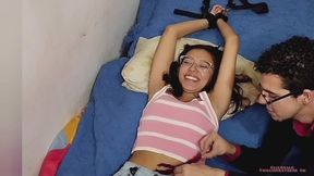 Camille tickling body and feet with feathers