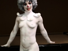 A clown dressed babe teasing amateur style
