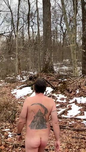Naked hiker explores nature with fellow nudists
