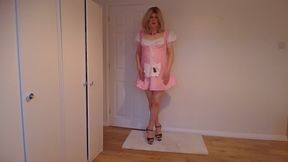 Pink costume, nude pantyhose and heels