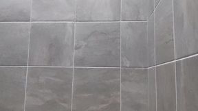 Tattooed goth Raven Black jerks off in public gym shower