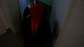 Petplay in latex suit