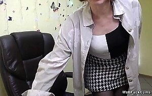 Redhead MILF in black and white top on webcam