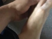Putting lotion on my feet