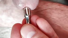 Urethral sounding close up