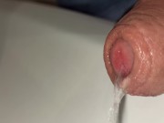 closeup foreskin while peeing