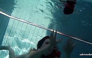 Mia babe swimming naked in the pool