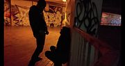 Whore degraded in parking garage