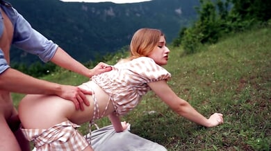 Blonde in checkered dress runs out of gas and rides him on the grassy hillside