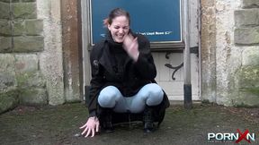 Sweet girl urinating outside in front of people