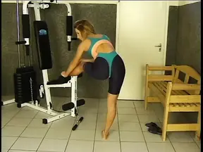 Sexy blonde slut takes on two hard cocks in the gym