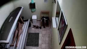 ”Shaved & Tight Snatch Caught in Solarium”