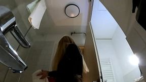 Blonde bombshell strips in bathroom, flaunting giant knockers, gigantic booty in high heels and pantyhose