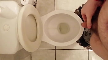 Pissing in the toilet