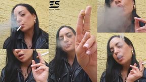 Outdoor smoke in a leather jacket