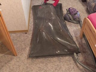 Siliconedoll get vacuumed in Vacbed with hands
