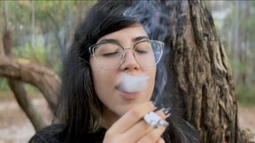 Enjoying two cigarettes