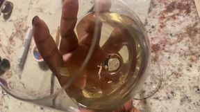 Giantess enjoys teenie in her drink