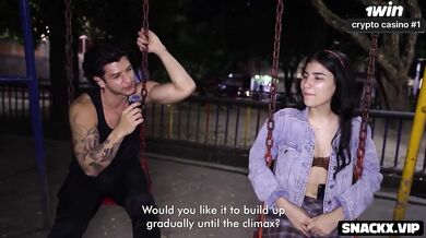 Colombian teenage model finishes laughing as big member takes position at playground