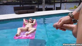Topless teen lounges poolside with giant boobs