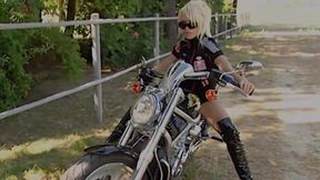 This Beautiful Biker Shows You the Curves of Her Body and Those of Her Motorbike