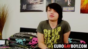 Long haired gay twink strokes his hard dick furiously