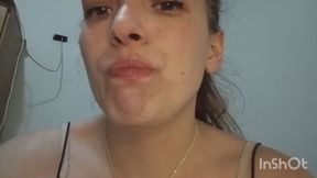 Chewing gum and blowing bubbles in front of the camera