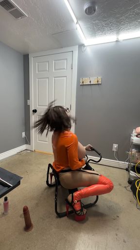 Key moment from "Velma riding her favorite chair with her huge cock and big tits"