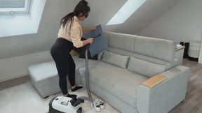Miss Cookie vacuums her Couch