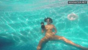 ”Amelie Bruna tasty brunette with big tits in the pool”