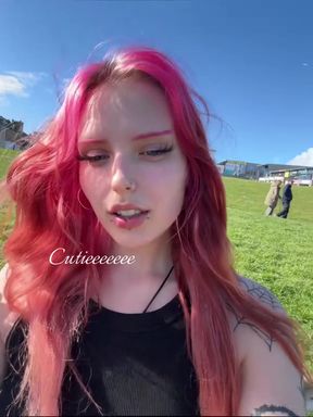 Long-haired goth white girl shows off her pink hair