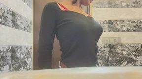 Sexy babe showing her boobs in bathroom