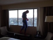 spider shoots onto hotel window