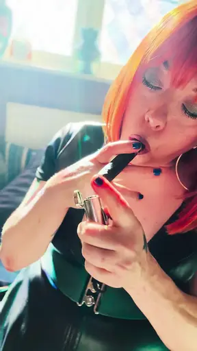 Hot MILF Tina Snua smokes cigars and seduces in leather