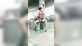 Twink masturbates and cums on public railway platform