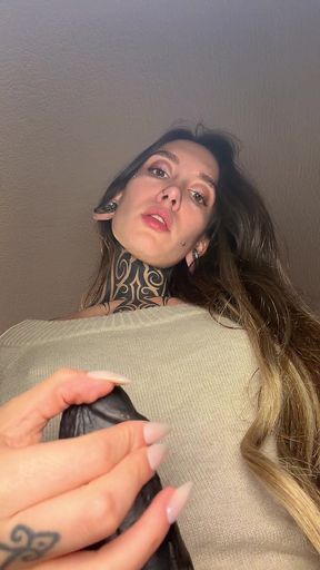 Woman with tattoos and piercings