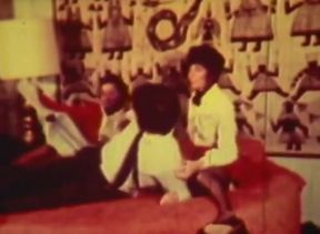 Red-tinted Vintage Loop Captures Retro Foursome in Raw Action